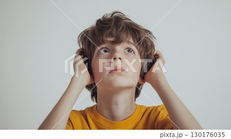 Thoughtful Boy Looking Upward 130176035