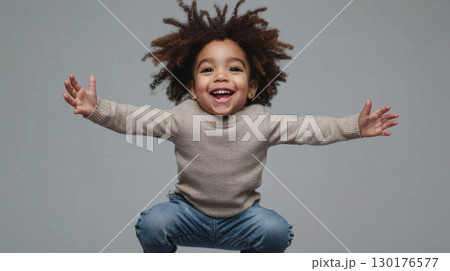Joyful Child Jumping 130176577