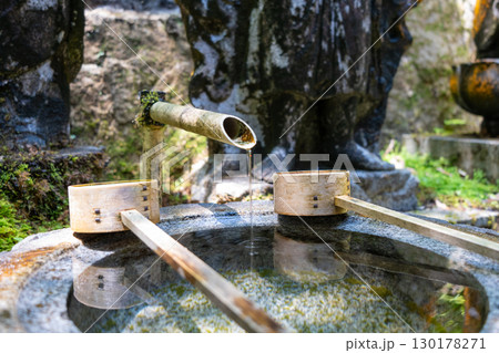 Hishaku ladle and chozuya fountain at Mitaki-Dera in Hiroshima Hishaku ladle and chozuya fountain at Mitaki-Dera in Hiroshima 130178271