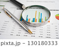 Magnifying glass on charts graphs paper. Financial development, Banking Account, Statistic, Investment Analytic research data economy. 130180333