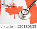 Canada flag with black stethoscope, Business and finance. 130180335