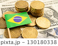Brazil flag on coin and banknote money, finance trading investment business currency. 130180338