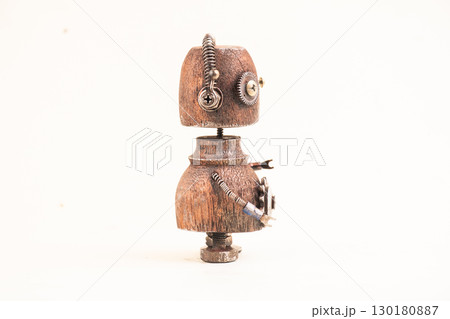 Wooden robot toy on isolated background 130180887