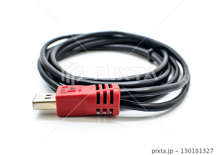 Isolated black and red computer cable on a clean white background 130181327