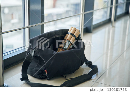 Close up view of time bomb in bag in the public place 130181738