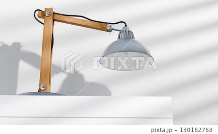 Retro or vintage style desk lamp, classic wooden arm with metal base and grey colored canopy, against white background, isolated. 130182788