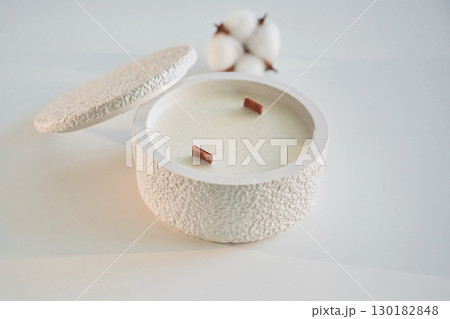 On white background. Handmade beautiful decorative candle 130182848