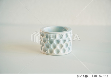 Handmade beautiful decorative candle on the background Handmade beautiful decorative candle on the background 130182863