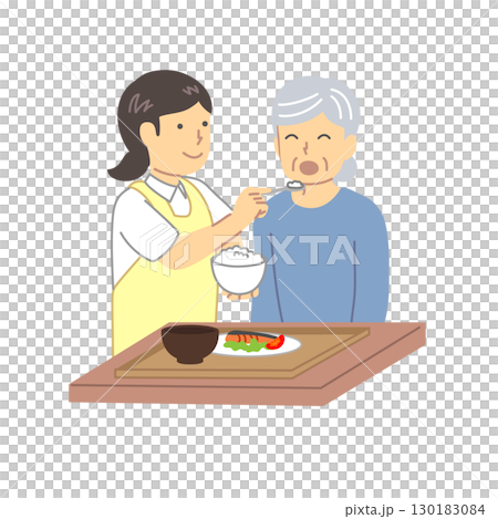 A caregiver assisting elderly people with meals 130183084