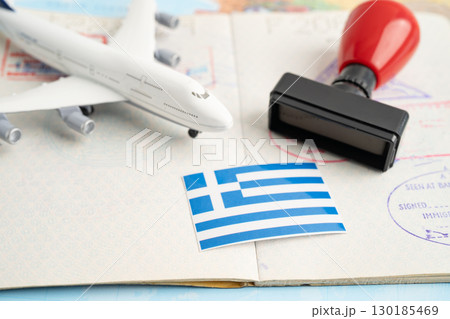 Greece passport with approved stamp on document for tourism to immigration at airport in country. Greece passport with approved stamp on document for tourism to immigration at airport in country. 130185469