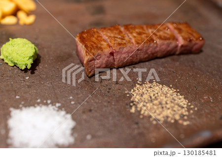 Kobe beef slices served with sesame salt and wasabi style 130185481
