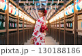 浴衣姿で夏祭りを楽しむ日本人女性｜風鈴と提灯が彩る幻想的な夏の風景 130188186