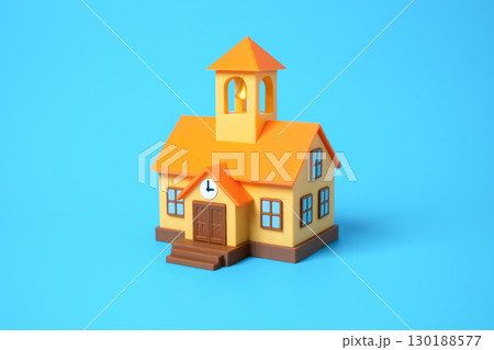 School building with a bell and clock on the facade. Education system, private school, public school, learning environment, children's studies, teaching and knowledge School building with a bell and clock on the facade. Education system, private school, public school, learning environment, children's studies, teaching and knowledge 130188577