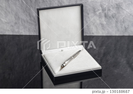 Fountain pen on dark marble background. Rare writing instruments. Fountain pen on dark marble background. Rare writing instruments. 130188687