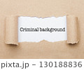 Criminal Background  text behind brown paper 130188836