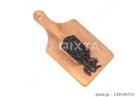 raisins in a scoop isolated on white background raisins in a scoop isolated on white background 130190355