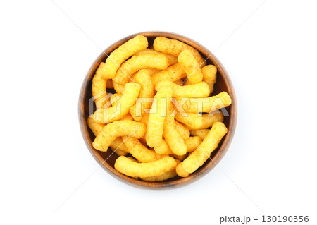 Puffed corn peanuts snacks isolated on white background. Puffed corn peanuts snacks isolated on white background. 130190356