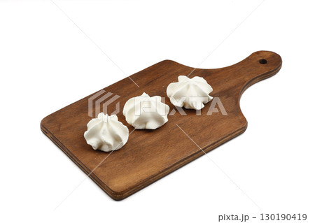 Meringue is a homemade French dessert made by mixing sugar and cooked eggs. Meringue is a homemade French dessert made by mixing sugar and cooked eggs. 130190419