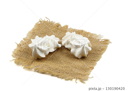 Meringue is a homemade French dessert made by mixing sugar and cooked eggs. Meringue is a homemade French dessert made by mixing sugar and cooked eggs. 130190420