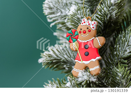 gingerbread man on christmas tree 130191339