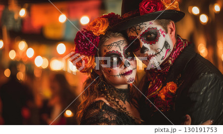 Couple celebrating Day of the Dead with traditional attire and elaborate calavera makeup in Mexico Couple celebrating Day of the Dead with traditional attire and elaborate calavera makeup in Mexico 130191753