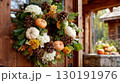 Autumn-themed wreath showcasing textured fall foliage for a festive Thanksgiving display at home 130191976