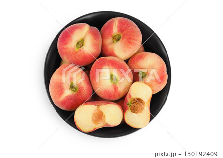 chinese flat donut peaches in ceramic bowl isolated on white background. Top view. Flat lay chinese flat donut peaches in ceramic bowl isolated on white background. Top view. Flat lay 130192409