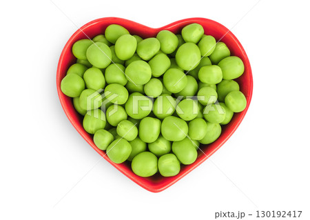 Fresh green peas in ceramic bowl isolated on white background. Top view. Flat lay 130192417