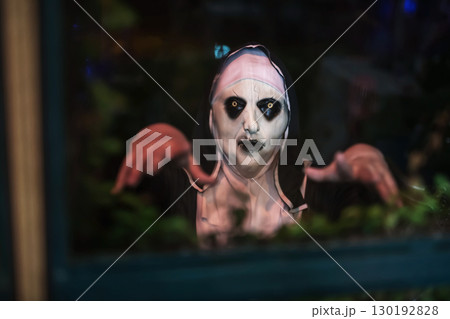 Scary female devilish nun look through window and strangle Scary female devilish nun look through window and strangle 130192828