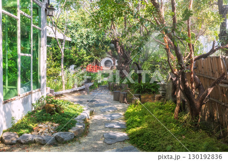 Japanese garden with artificial fog or steam of cafe restaurant Japanese garden with artificial fog or steam of cafe restaurant 130192836