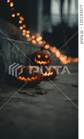 Halloween pumpkins glowing on a festive evening Halloween pumpkins glowing on a festive evening 130193077