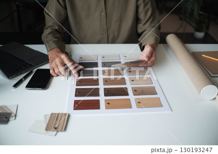 Architecture and Interior Designer man choosing interior materials. 130193247