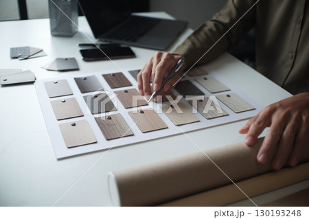Architecture and Interior Designer man choosing interior materials. 130193248