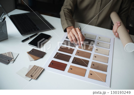 Architecture and Interior Designer man choosing interior materials. 130193249