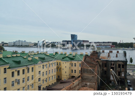 An Urban Landscape Showcasing a Picturesque Riverfront Alongside Historical Architecture 130193479
