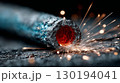 A sparkler burning down to a glowing ember 130194041
