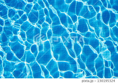 blue water waves on surface in swimming pool, top view blue water waves on surface in swimming pool, top view 130195324