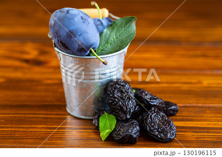 Healthy prunes and sweet plum with antioxidant vitamins Healthy prunes and sweet plum with antioxidant vitamins 130196115