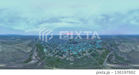 default360 panoramic view of a city with green rooftops and a river at dusk 130197002
