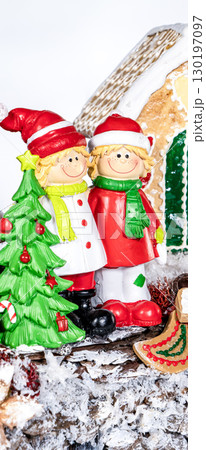 Christmas wreath candle candle gingerbread tree white snow isolated 130197097