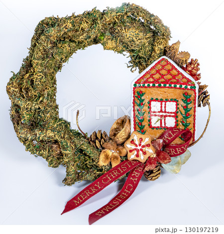 Christmas wreath candle candle gingerbread tree white snow isolated 130197219