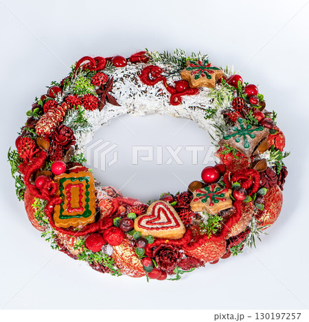 Christmas wreath candle candle gingerbread tree white snow isolated 130197257