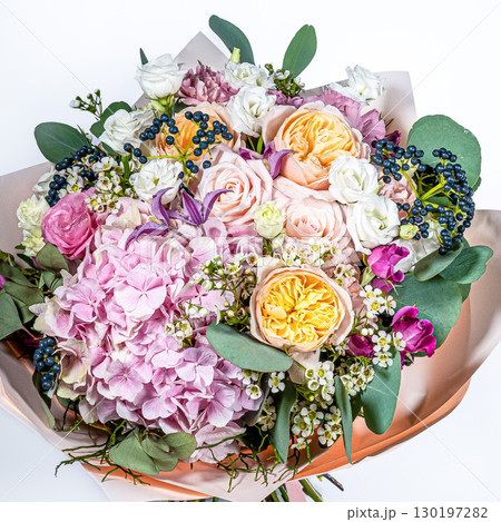 Bouquet of fresh delicate flowers on a white background gift 130197282
