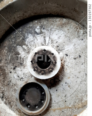 Aerator Diffuser Showing Wear and Residue on a Metal Base After Prolonged Use in Outdoor Conditions 130197302