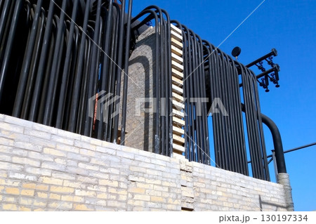 Installation of a Steam Boiler Featuring Extensive Piping and Masonry Details Installation of a Steam Boiler Featuring Extensive Piping and Masonry Details 130197334