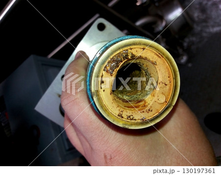 Inspection of a Screw Pump Stator Showing Internal Corrosion and Wear at a Maintenance Facility Inspection of a Screw Pump Stator Showing Internal Corrosion and Wear at a Maintenance Facility 130197361
