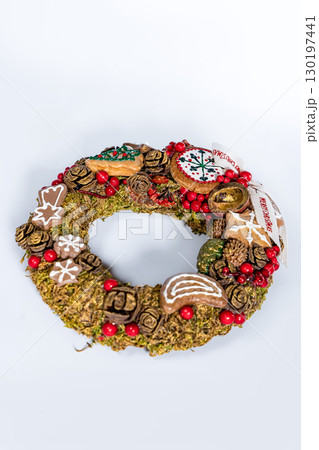Christmas wreath candle candle gingerbread tree white snow isolated 130197441
