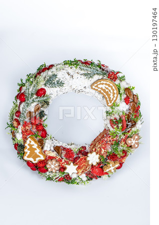 Christmas wreath candle candle gingerbread tree white snow isolated 130197464