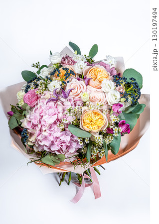 Bouquet of fresh delicate flowers on a white background gift 130197494