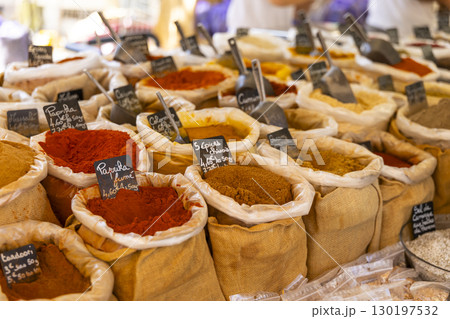 Colorful spices for sale at the market in Nyons, France Colorful spices for sale at the market in Nyons, France 130197532